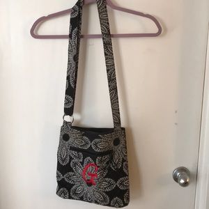 Vera Bradley cross body purse with red “G”